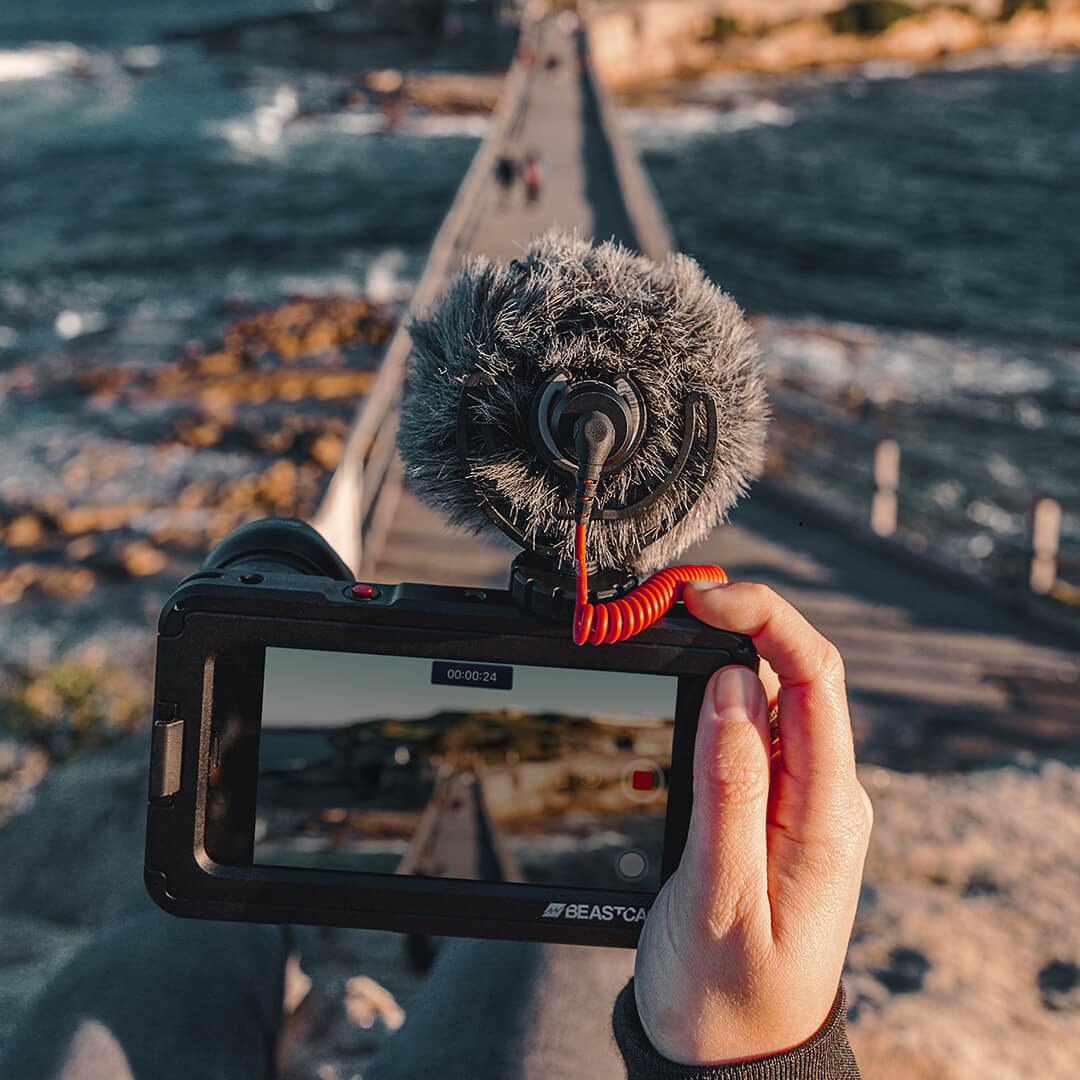 IN-situ shot of someone vlogging with a Rode VideoMicro Compact Microphone