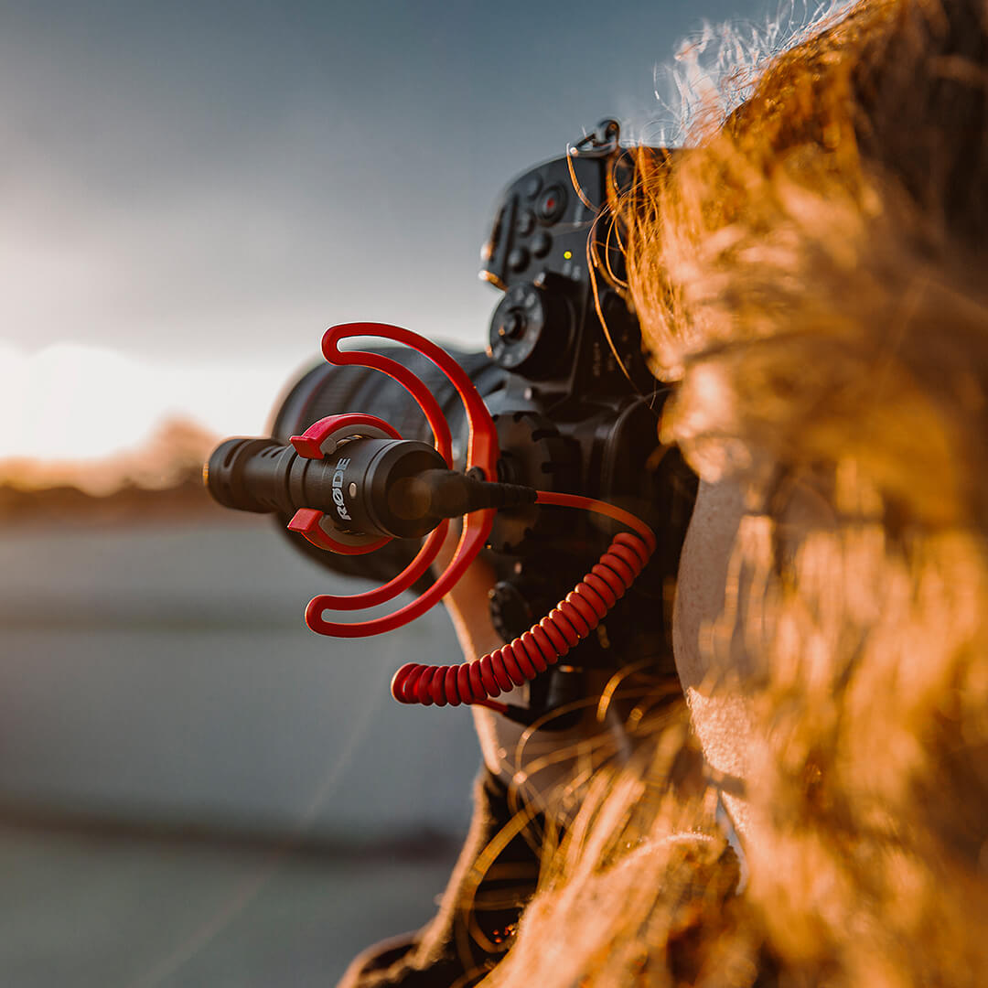 Pic of someone using a Rode VideoMicro Compact Microphone on a camera