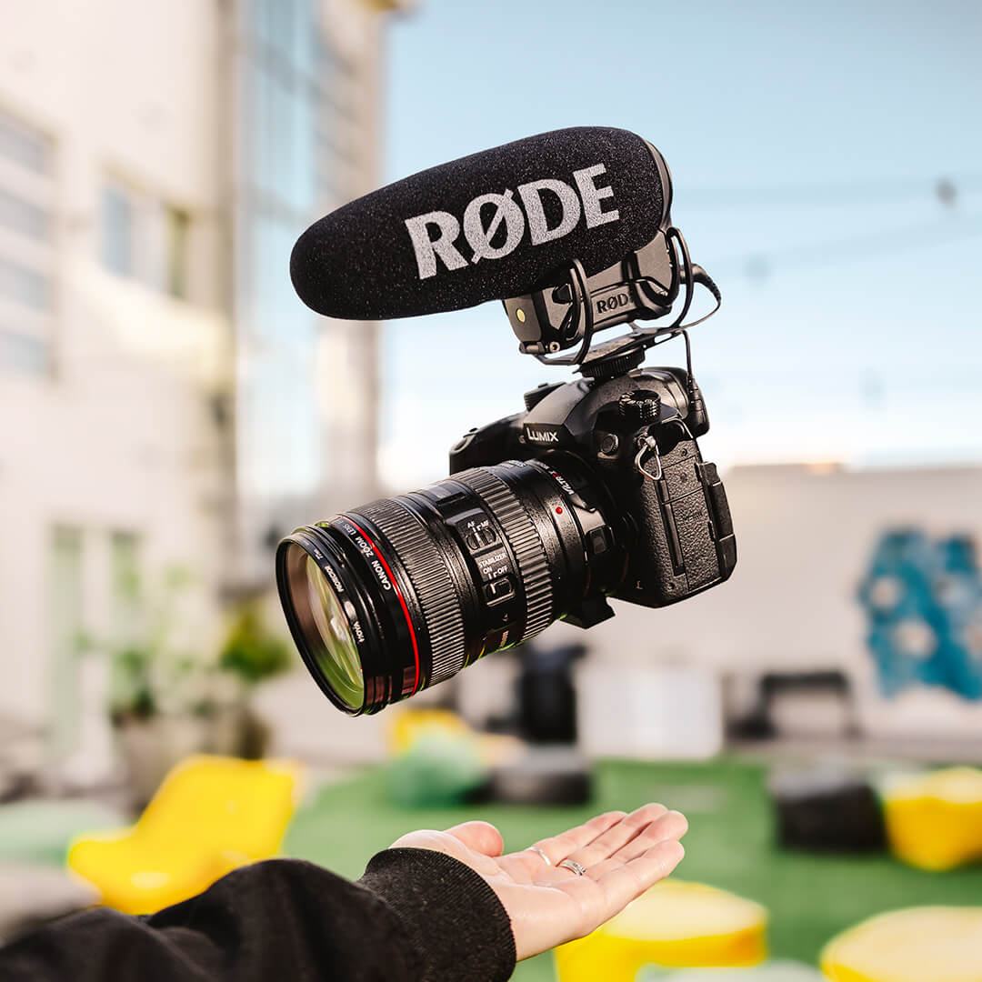 VideoMic Pro+ mounted to camera floating above hand