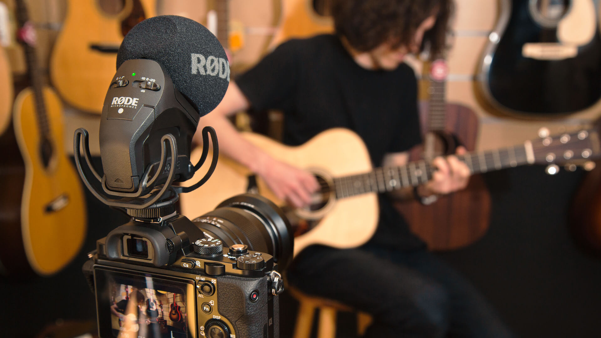 Stereo VideoMic Pro on camera that is filming guitarist