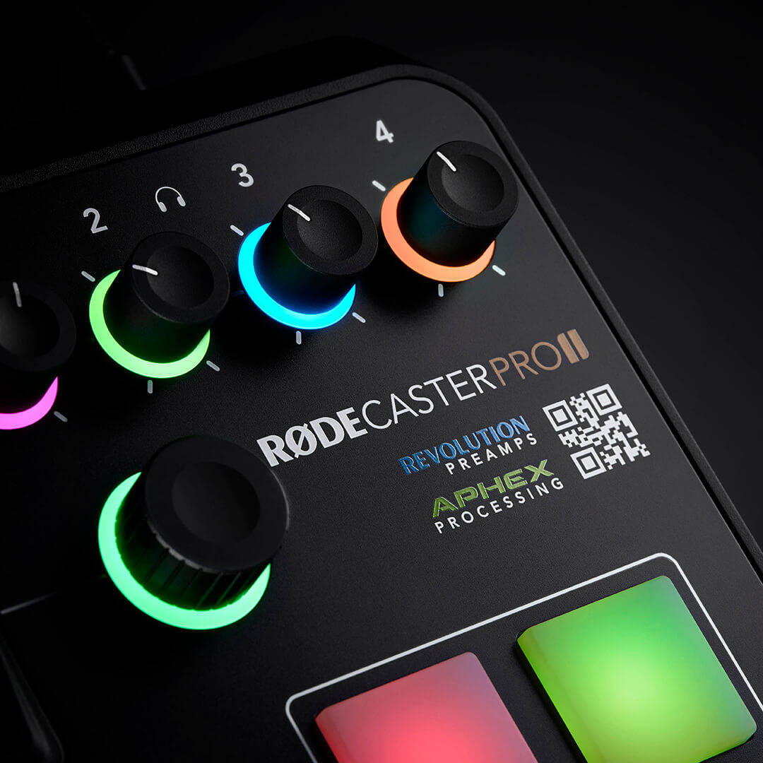 RØDECaster Pro II on black with close up shot of headphones volume knobs
