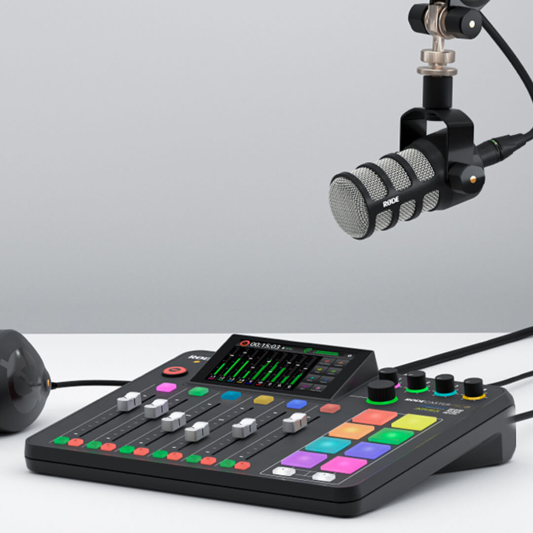 RØDECaster Pro II on table next to PodMic and NTH-100