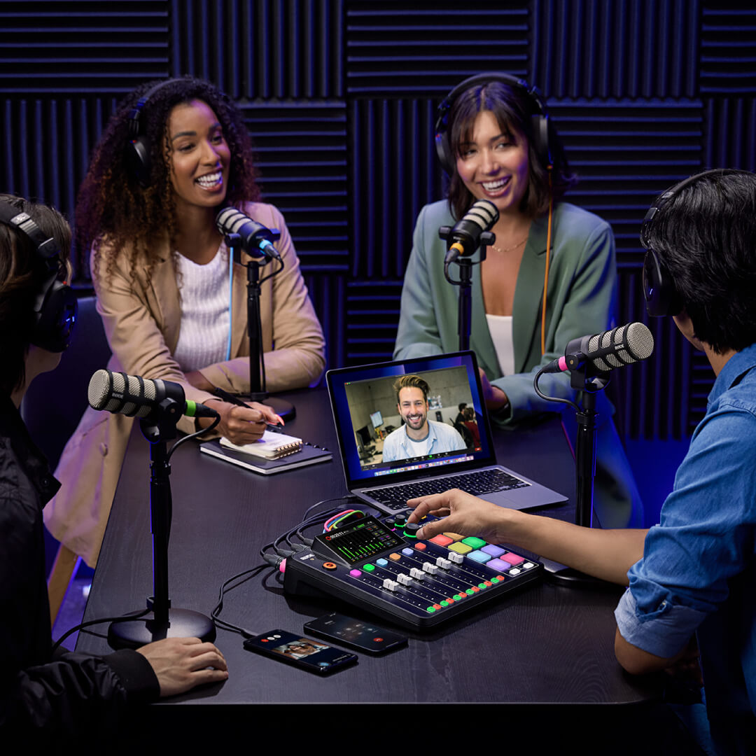 Four podcasters with PodMics on DS1s recording with RØDECaster Pro II