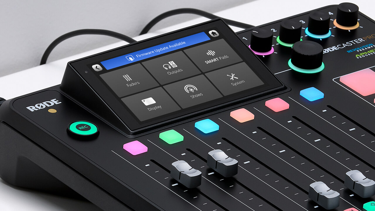 RØDECaster Pro II on white table with display showing Firmware Update Available