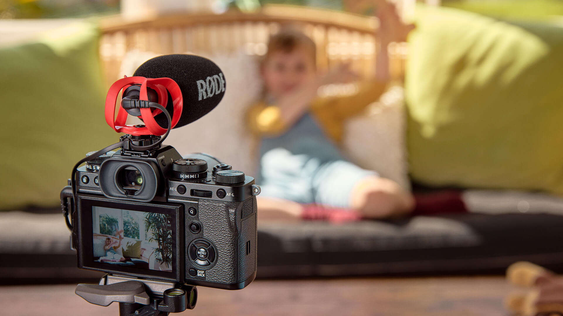 VideoMicro II on camera recording boy on couch