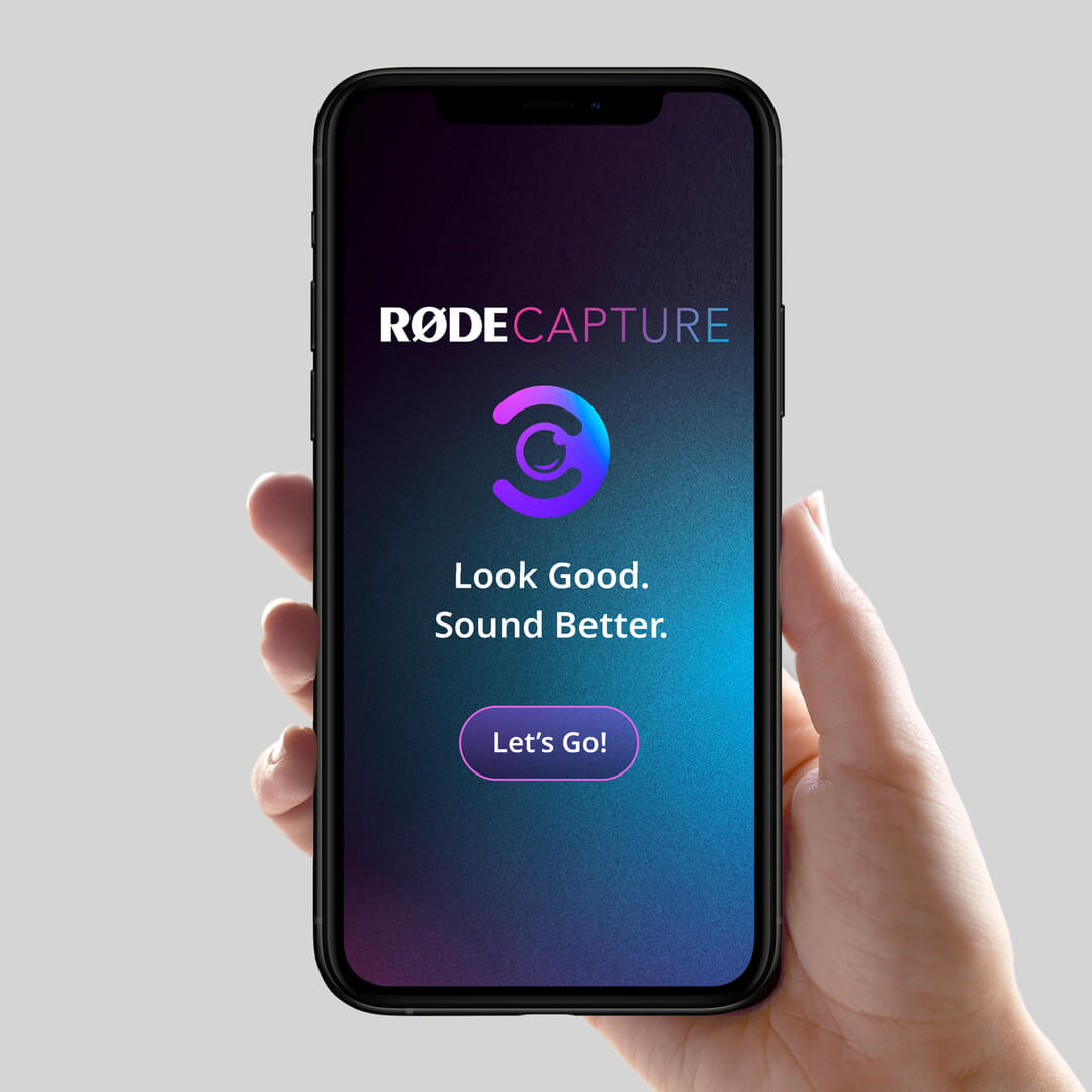 Hand holding mobile phone showing RØDE Capture start screen